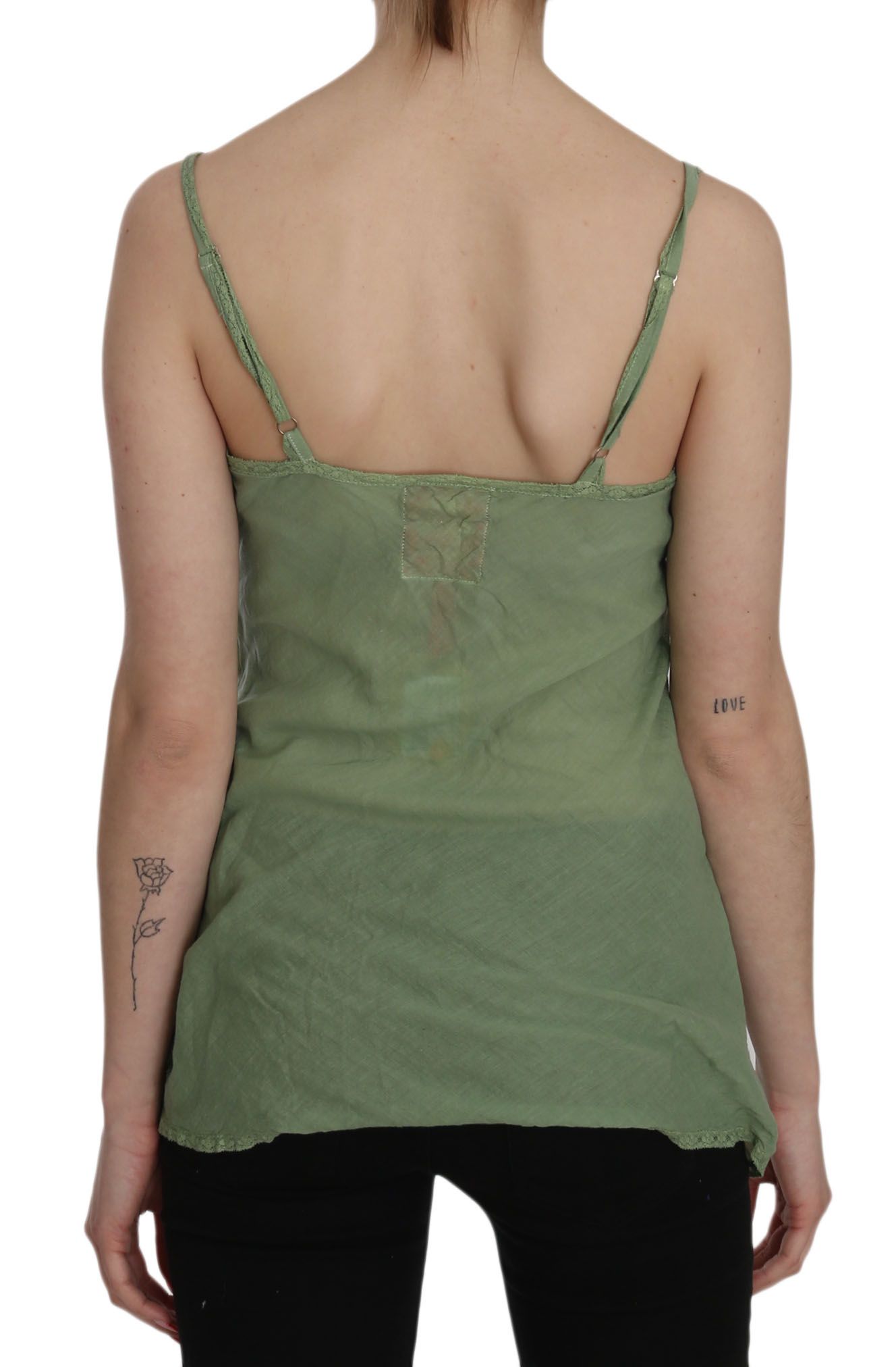 Green tank top on woman's back