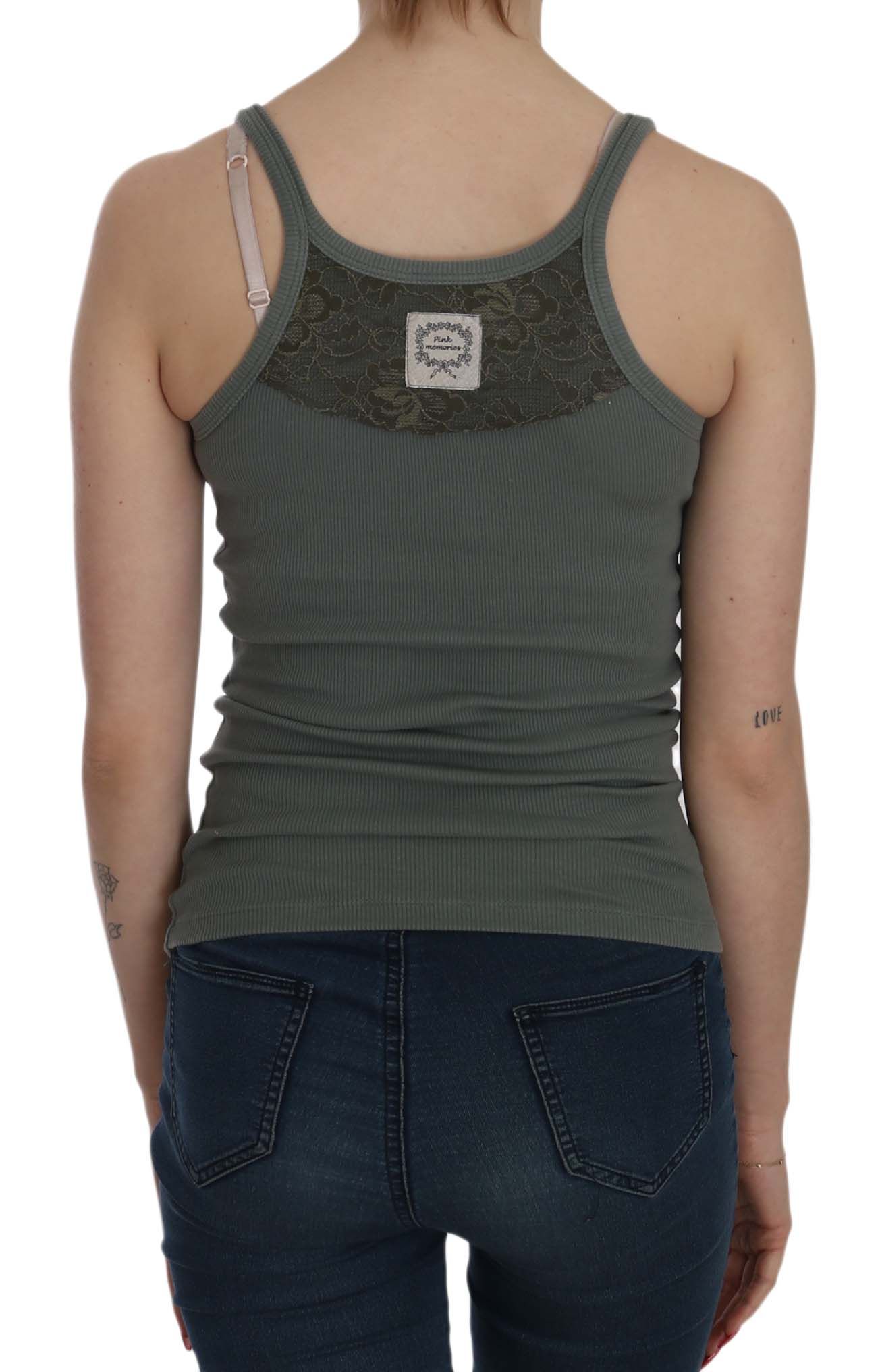 Woman wearing tank top and jeans