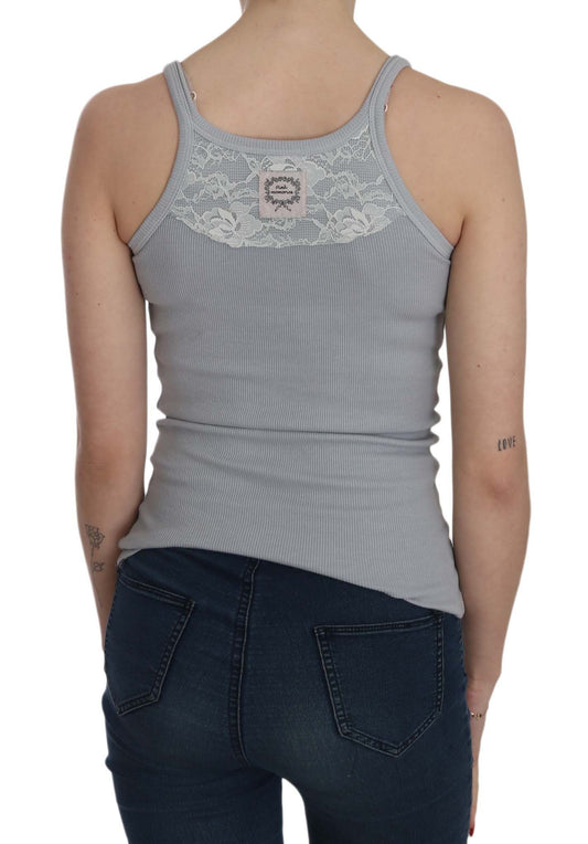 Woman wearing tank top and jeans