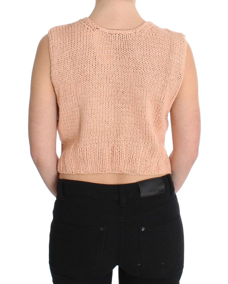 Pink knit top on woman's back