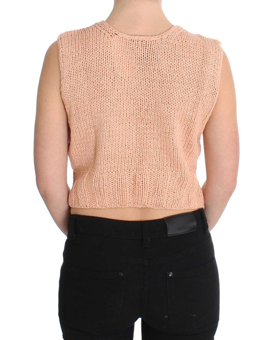 Pink knit top on woman's back