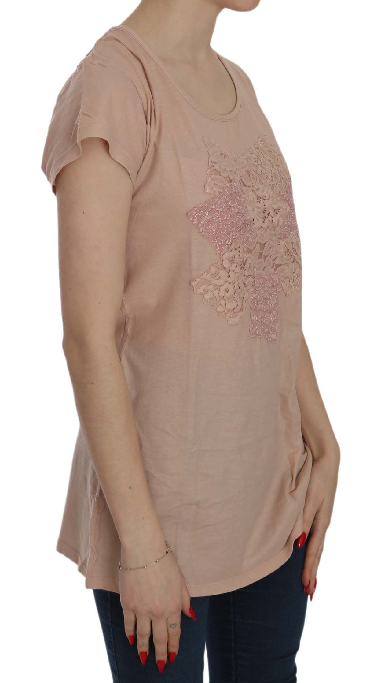 Pink maternity top with embroidery on front