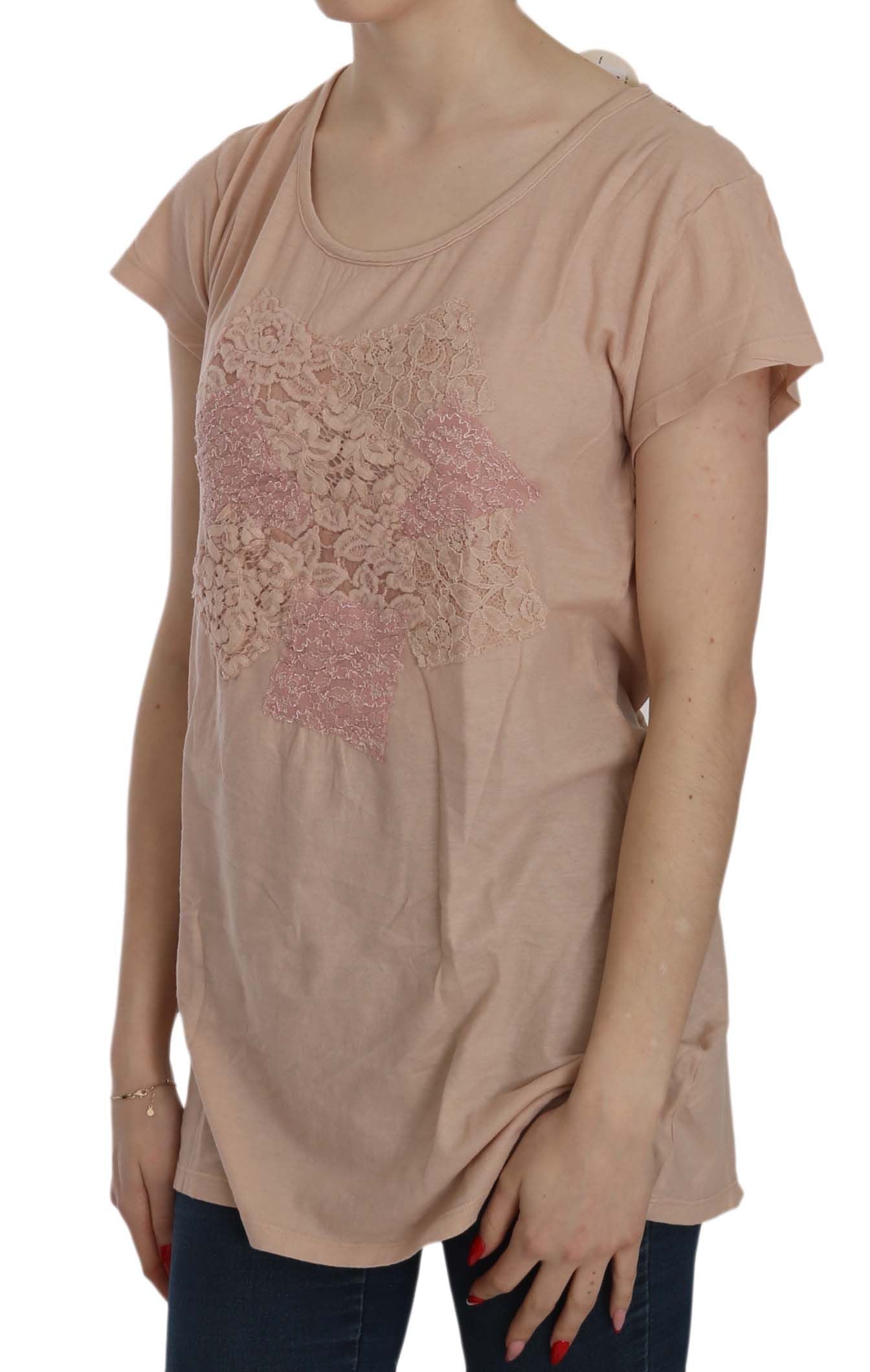 Pink maternity top with embroidered design