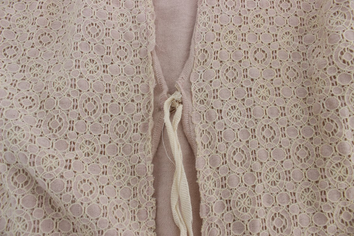 Pink lace garment with button closure