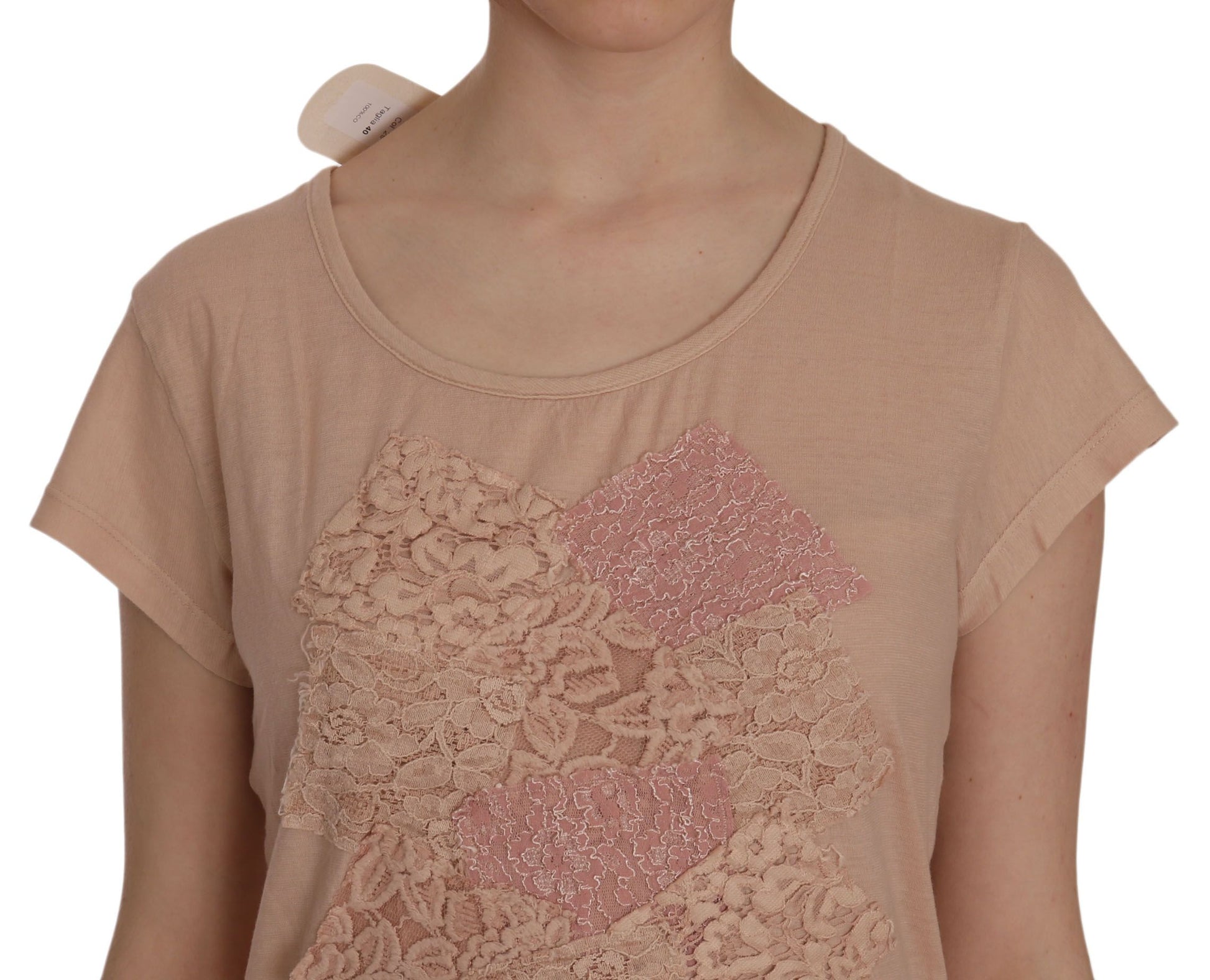 Pink lace top with embroidered heart design