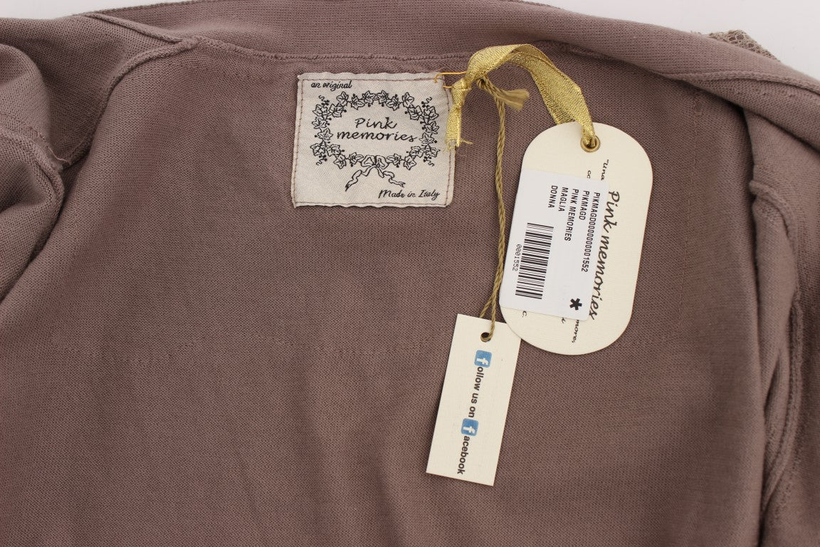 Brown sweater with tag attached to neck
