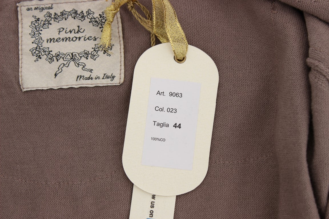 Tag on a garment indicating size and care instructions