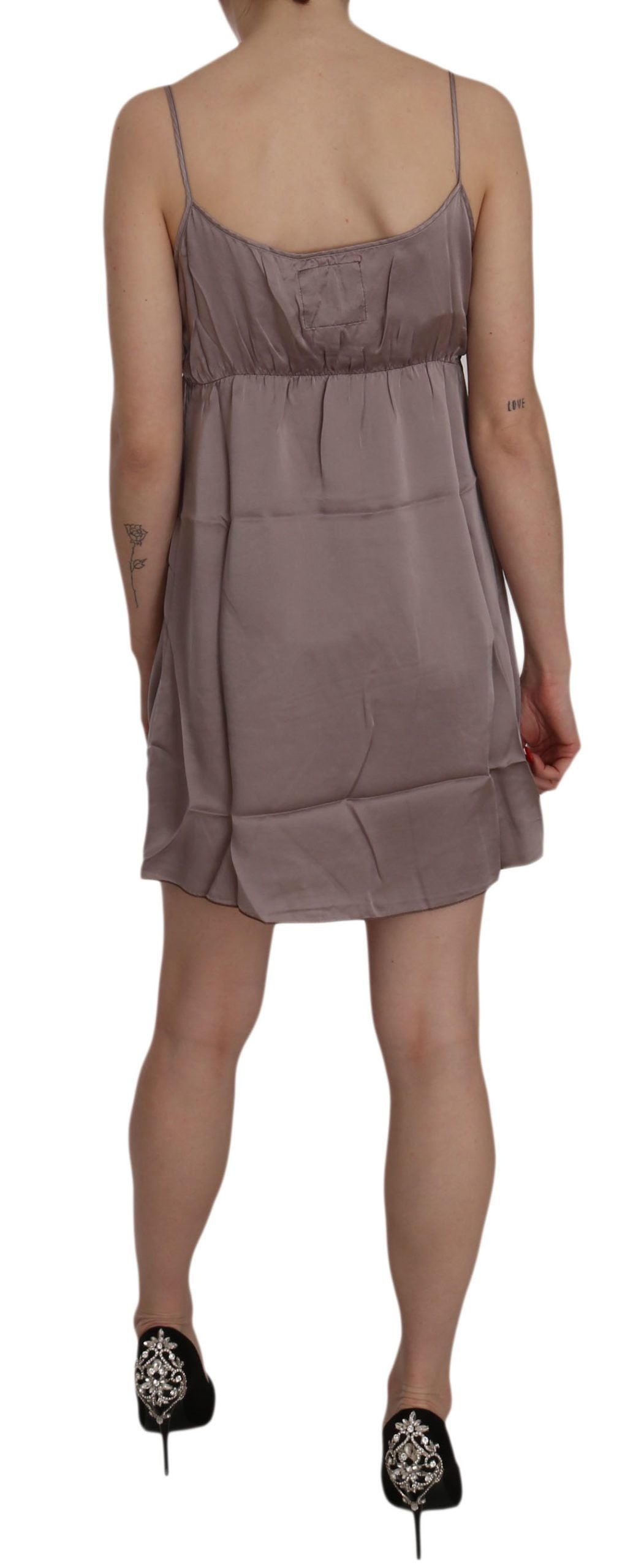 A-line mini dress with spaghetti straps and a sheer overlay