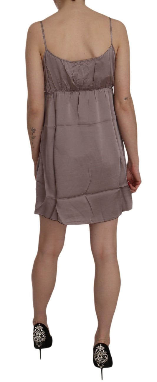A-line mini dress with spaghetti straps and a sheer overlay