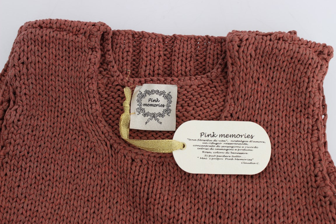 Knitted sweater with tag on neck