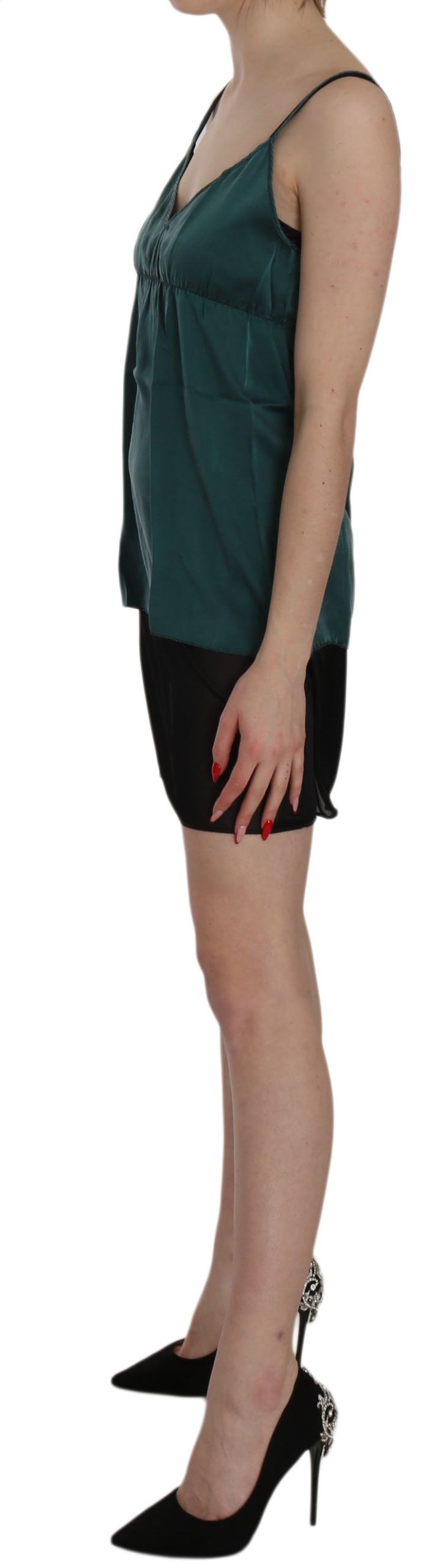 A green spaghetti strap shift mini dress with a pinkish hue