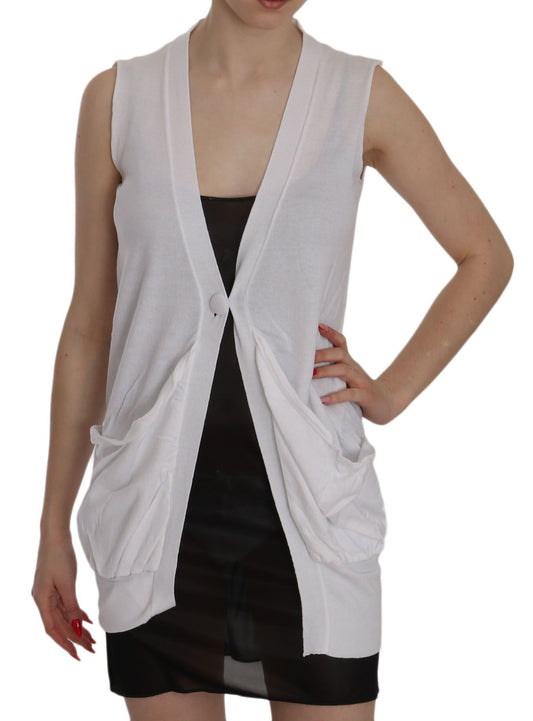 White sleeveless vest over black dress