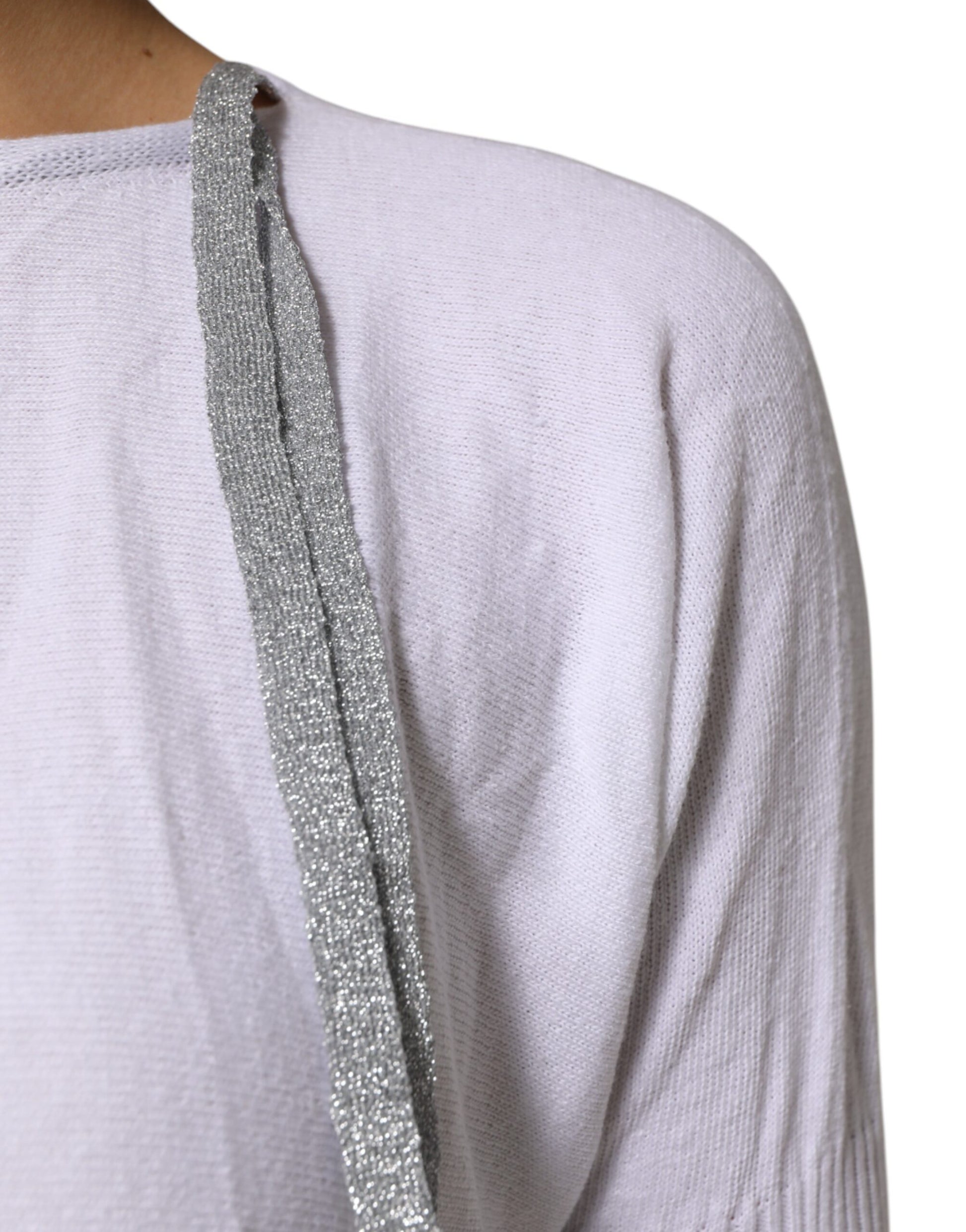 Silver sequin necklace on a purple shirt
