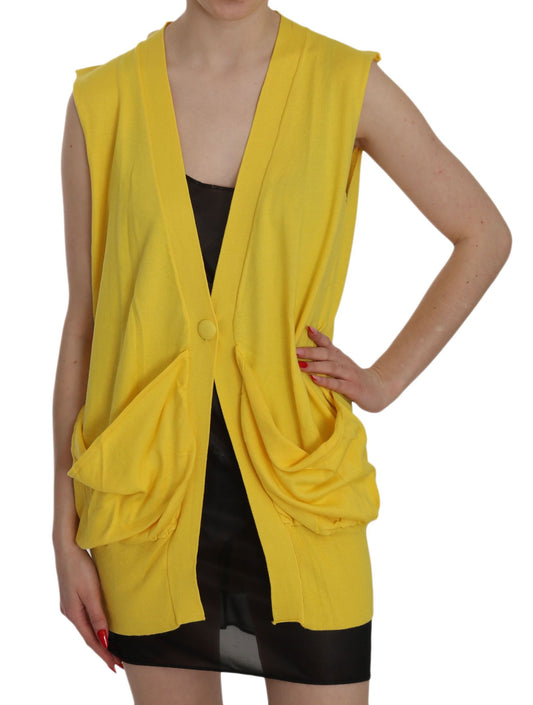Yellow knit vest over black dress