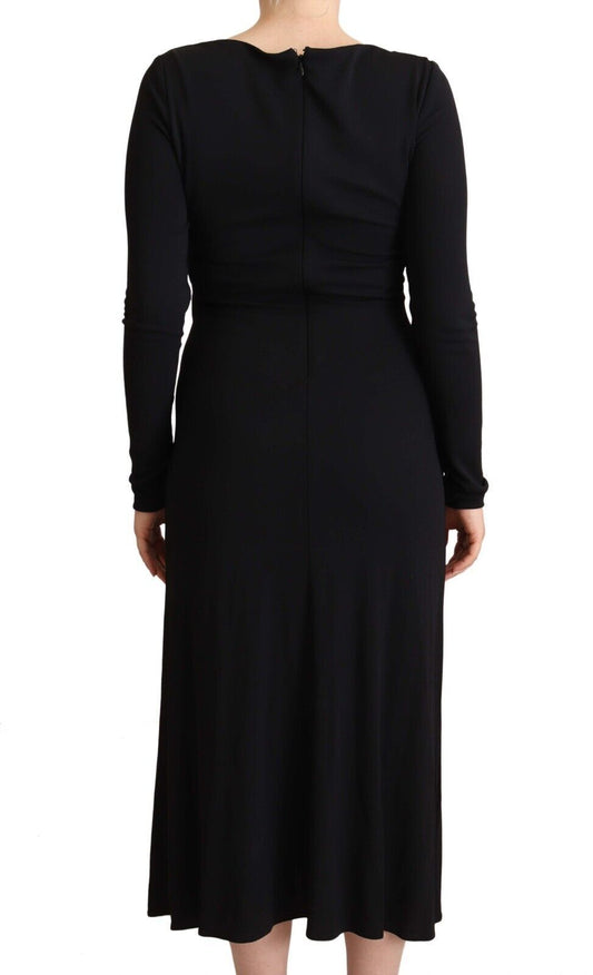A long black nylon dress with a deep V-neck and long sleeves