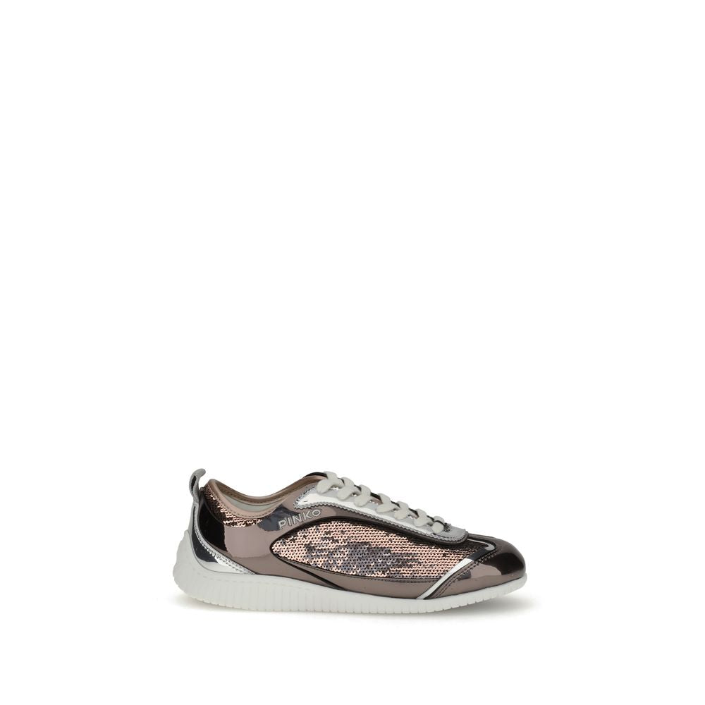 Pink and white sneaker with a patterned sole