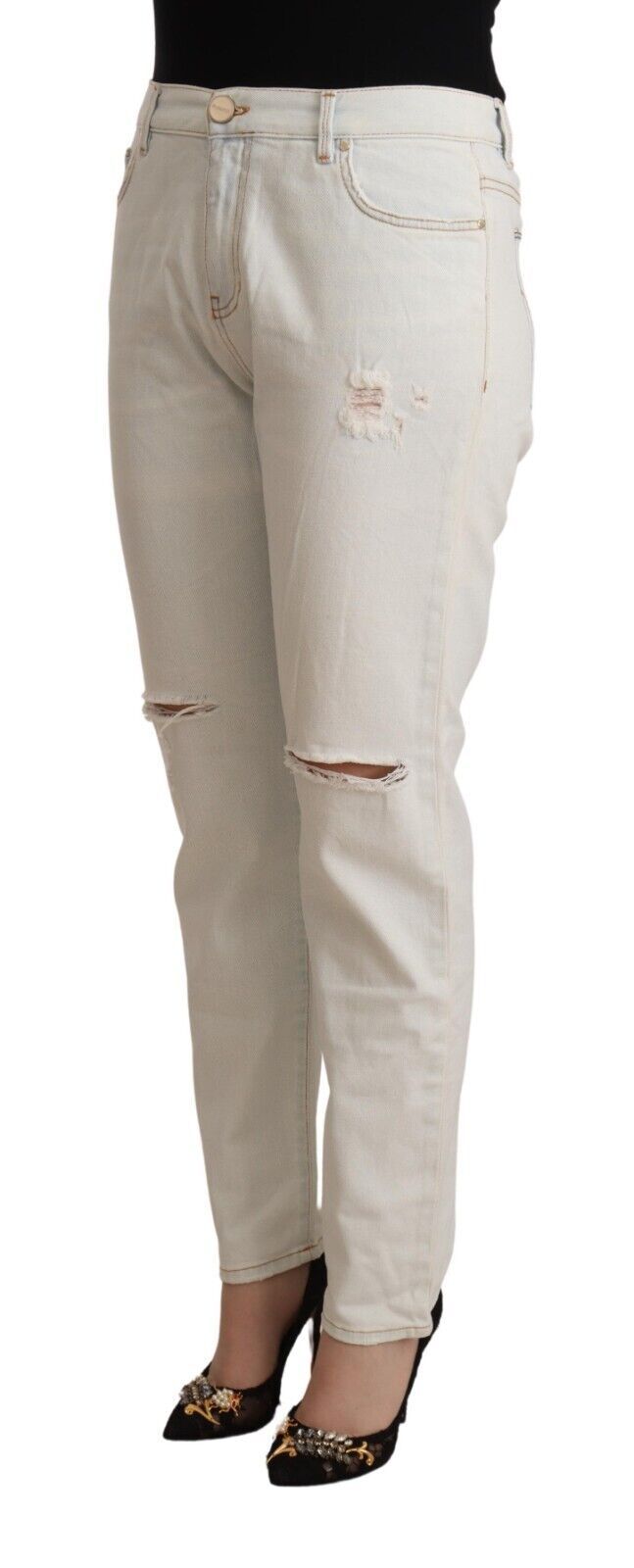 Pair of light wash denim jeans with distressed knees