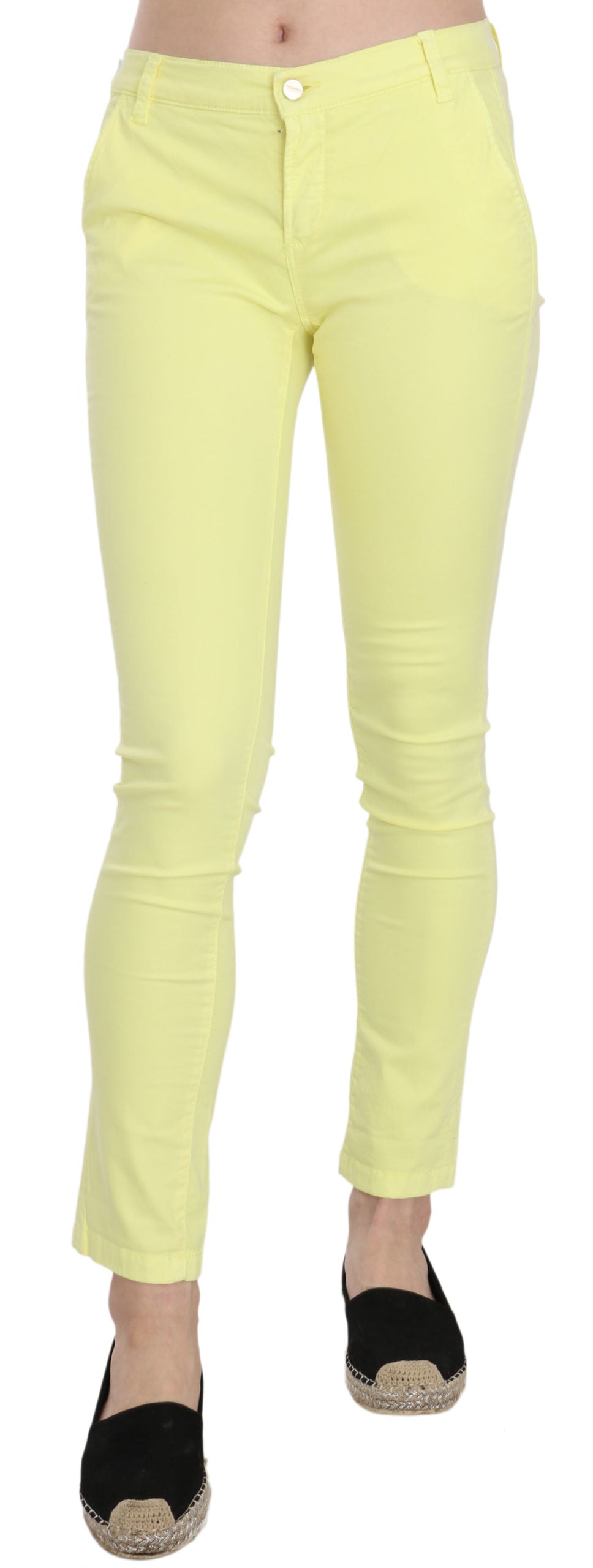 Yellow skinny jeans on a mannequin