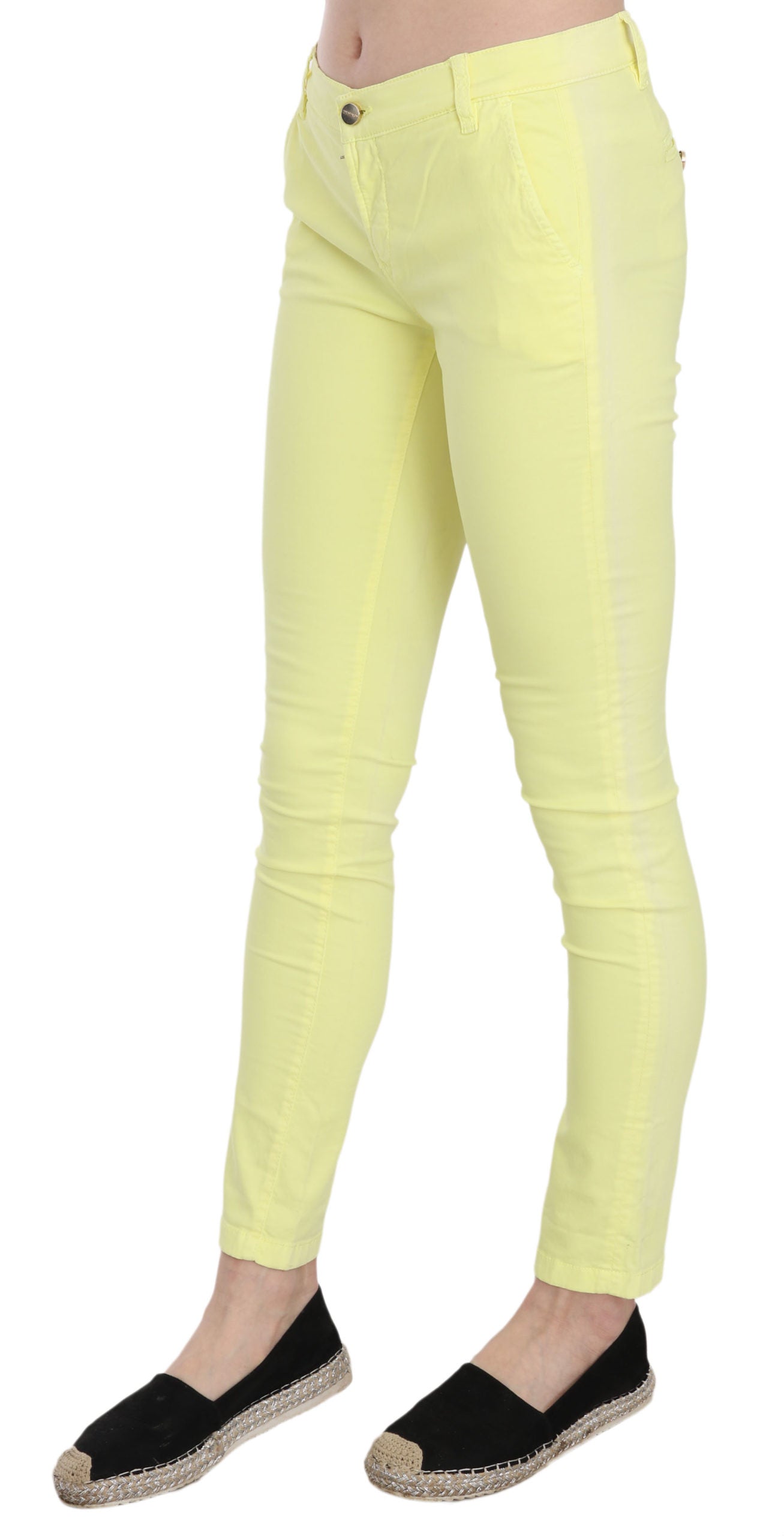 Yellow skinny jeans on a mannequin