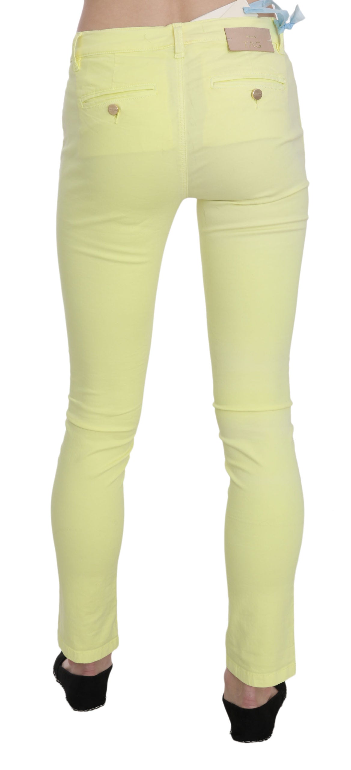 Yellow skinny jeans on a mannequin