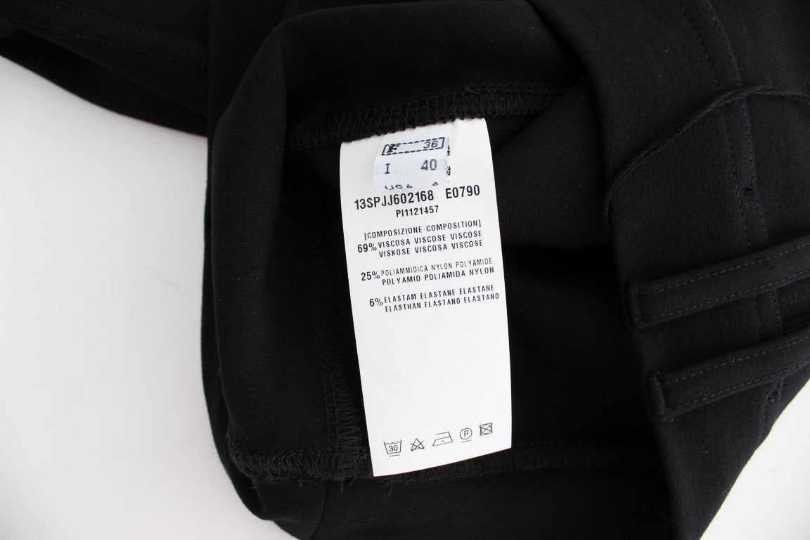 Black clothing item with white tag