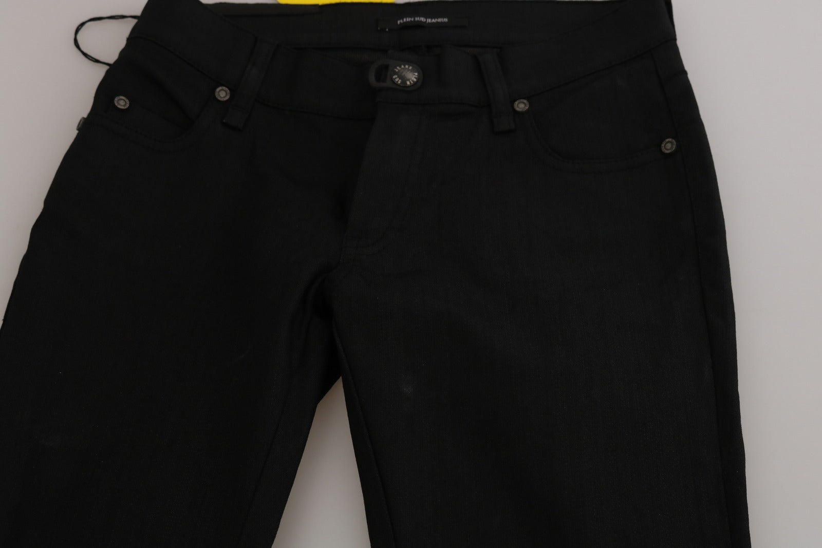 Pair of black jeans on display