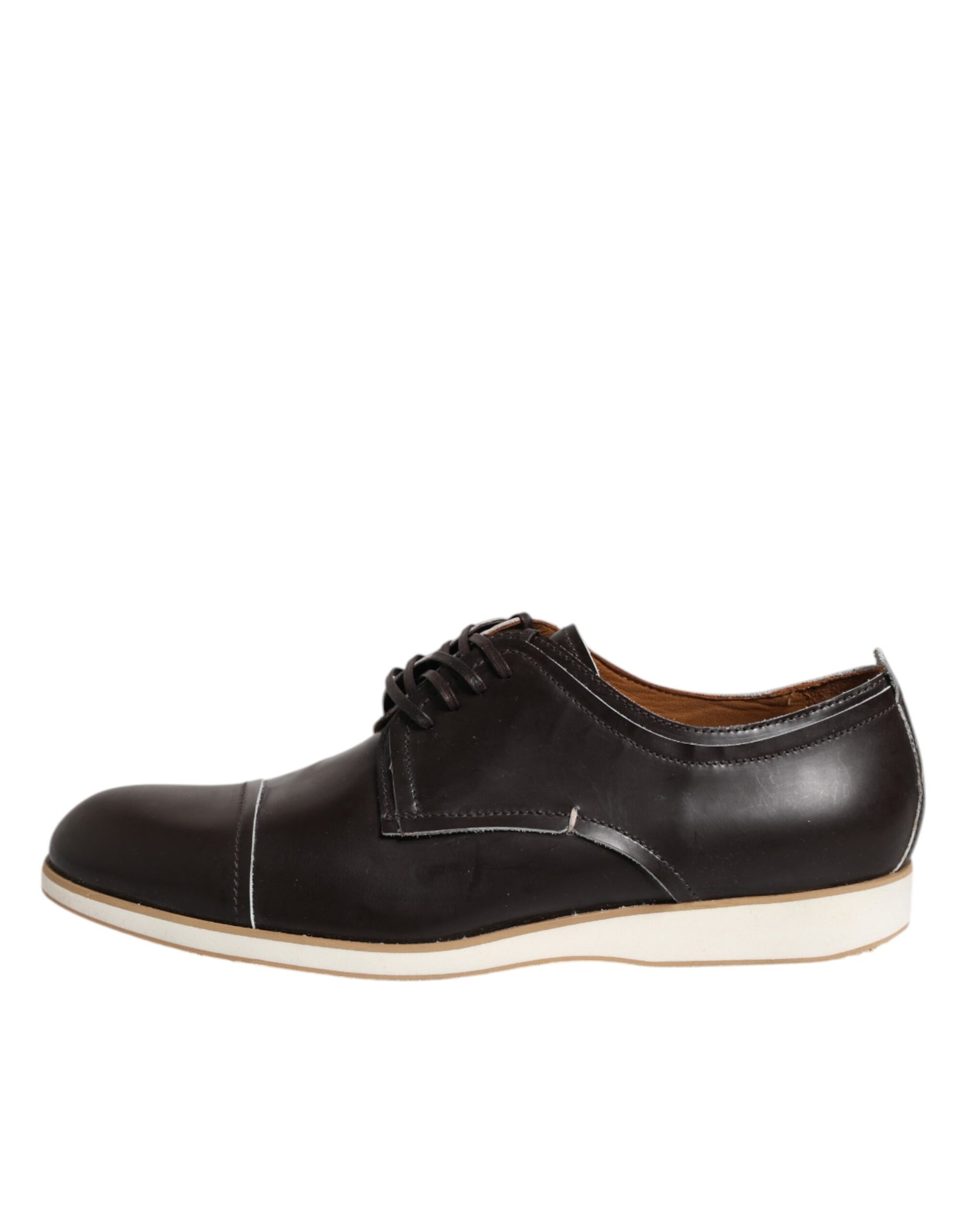 A pair of dark brown leather lace-up dress shoes with a white sole, designed by Pollini