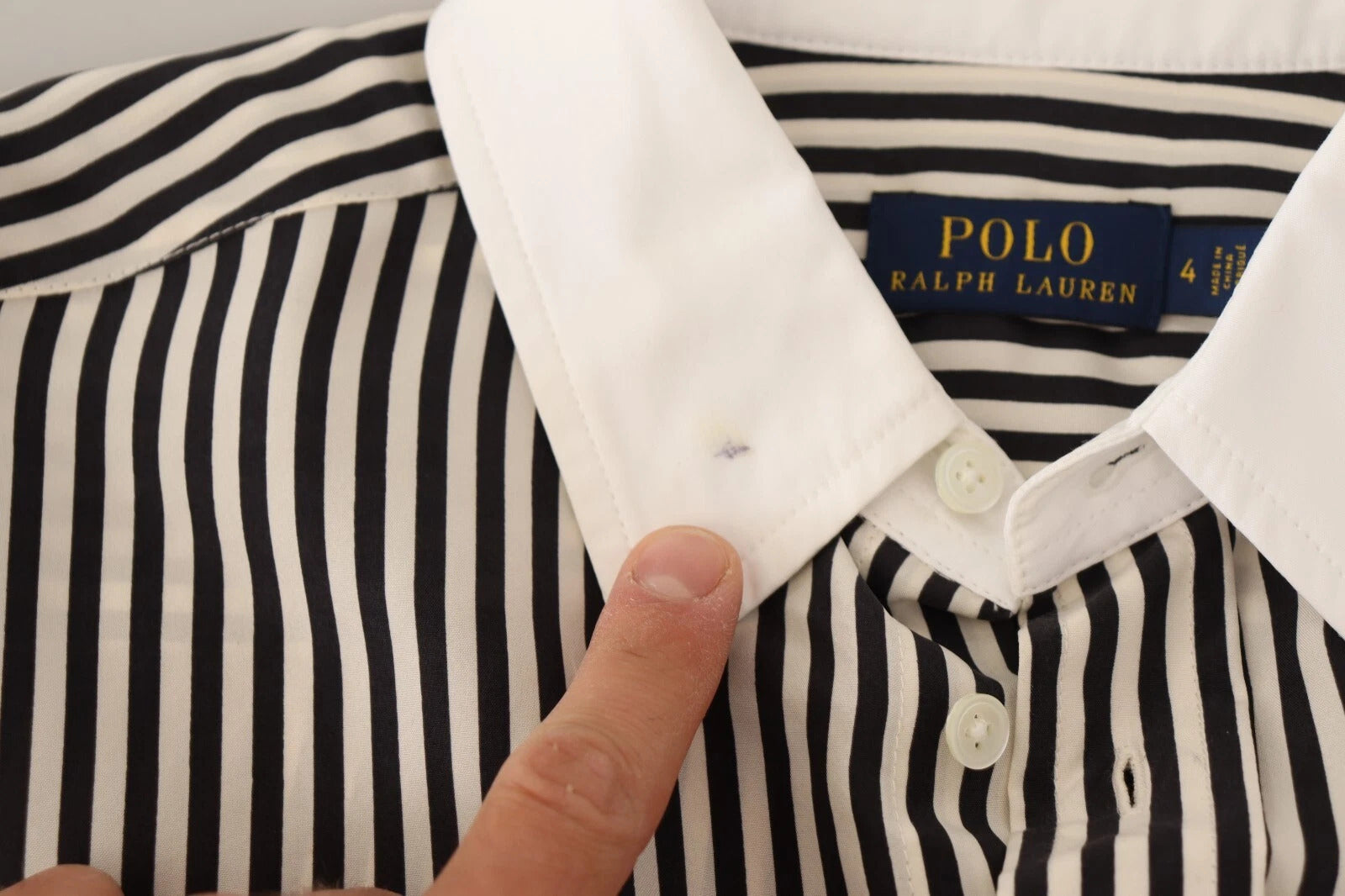 Striped polo shirt with button down collar