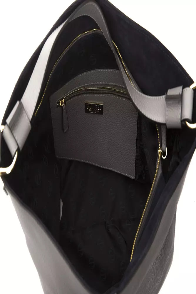 Black leather handbag with gold zipper pulls