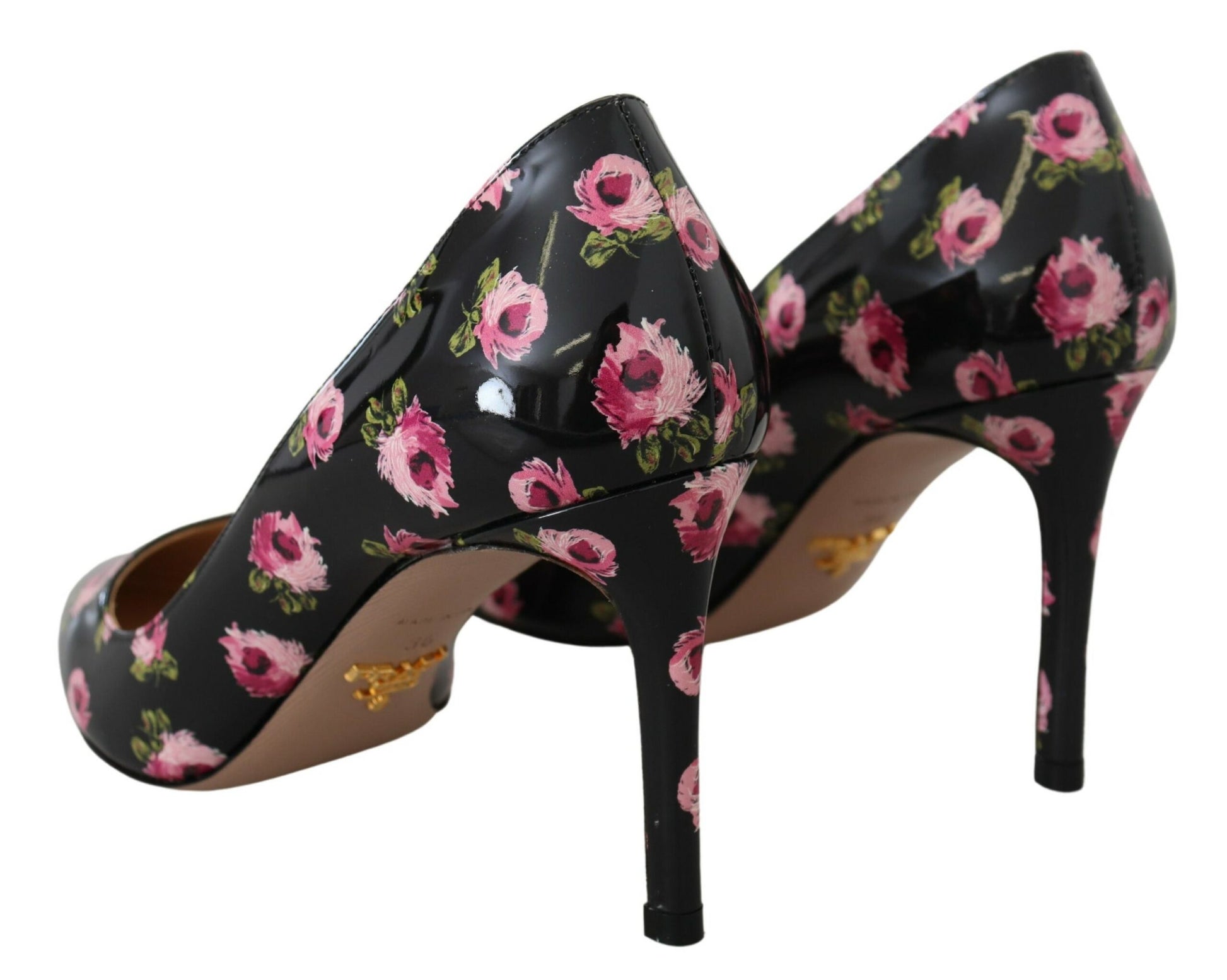 Pair of black high heel shoes with floral print