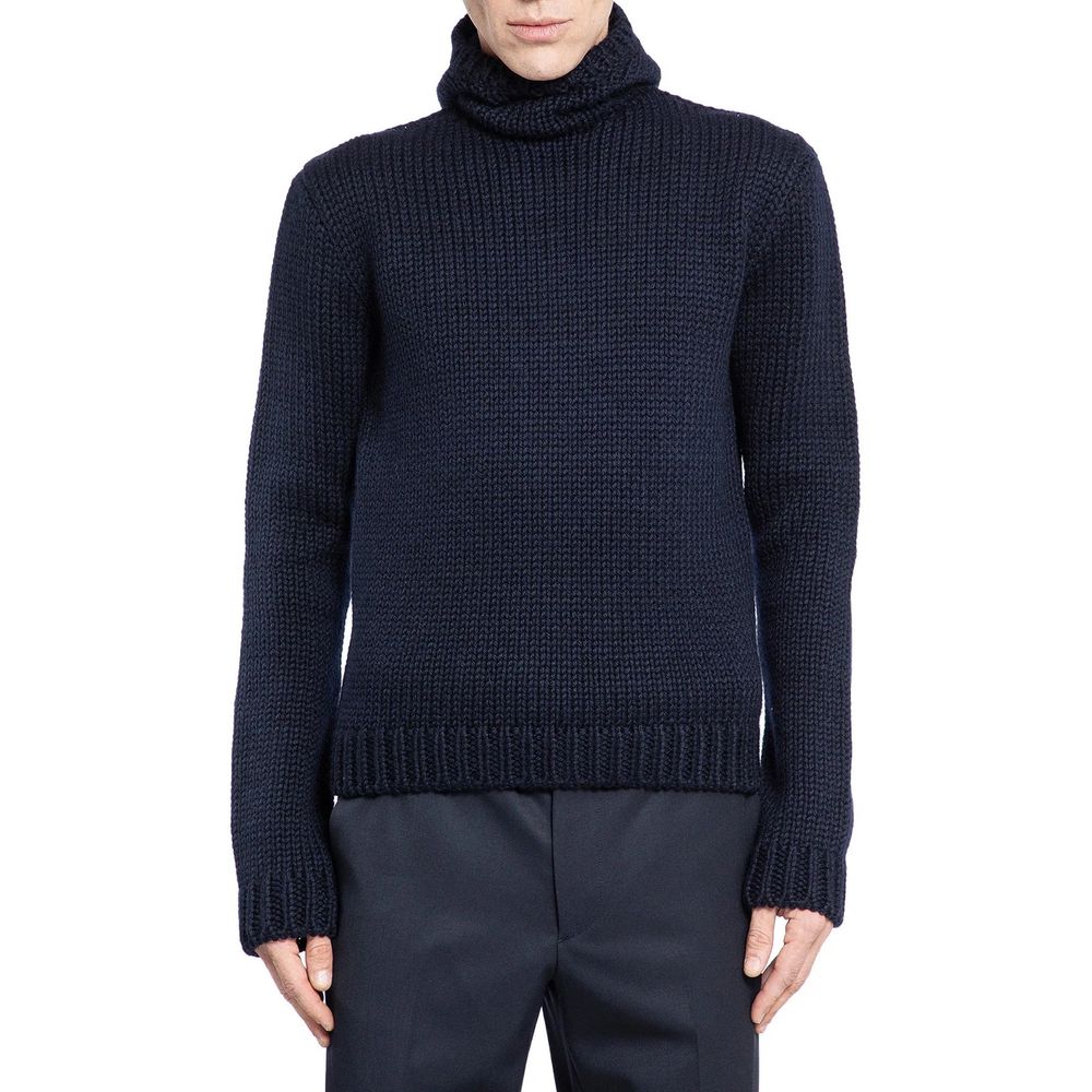 Man wearing dark blue knit sweater