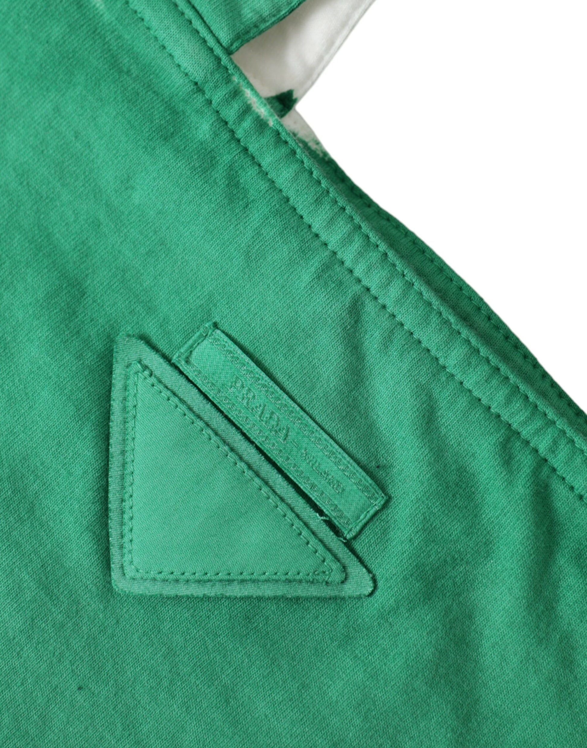 Green fabric with a logo on the left side