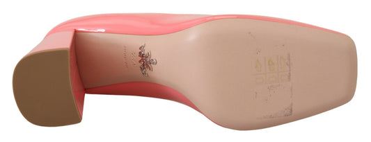 Pair of red shoes with white soles and laces