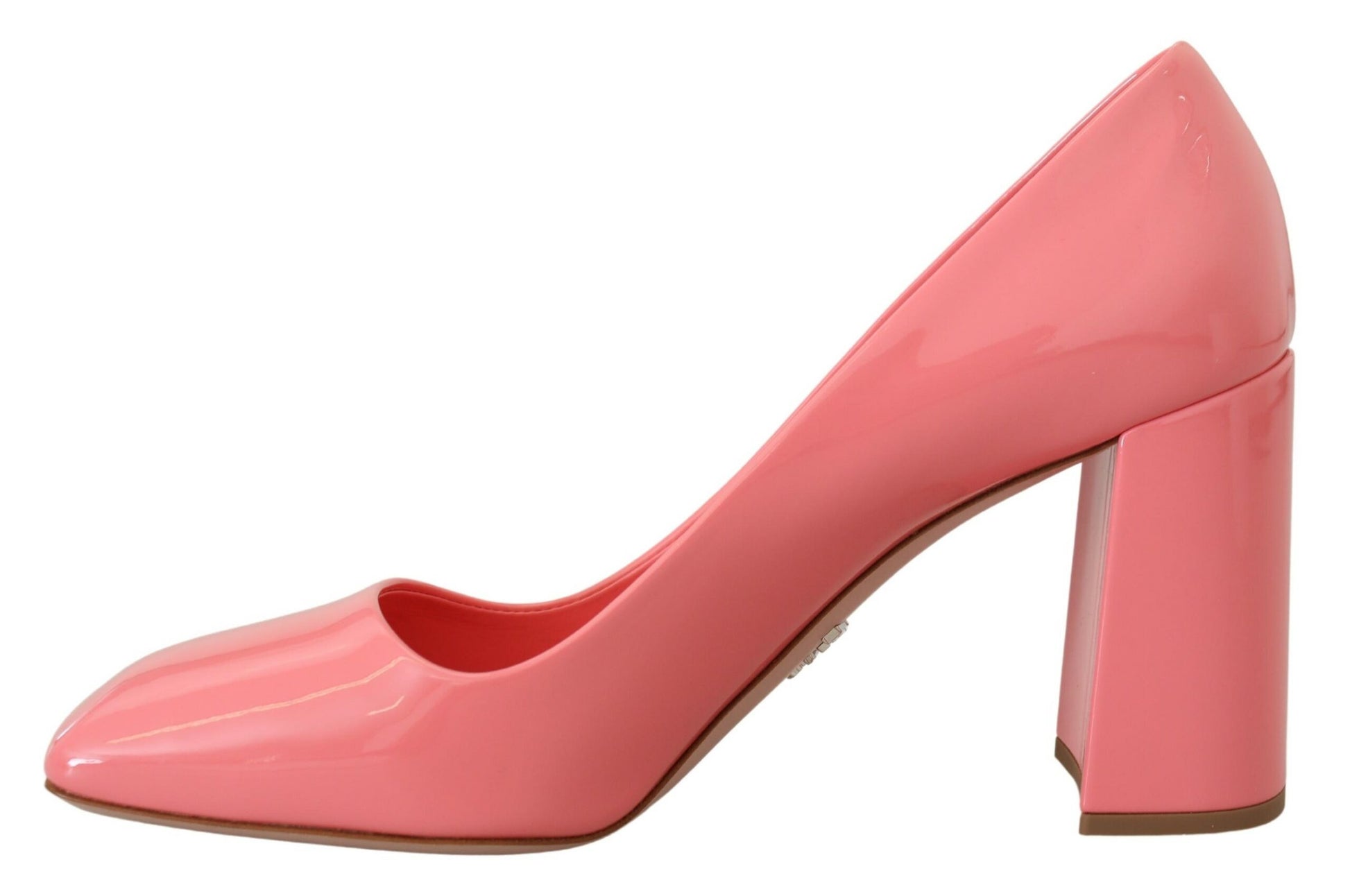 Pair of red high heel shoes with pointed toe and stiletto heels
