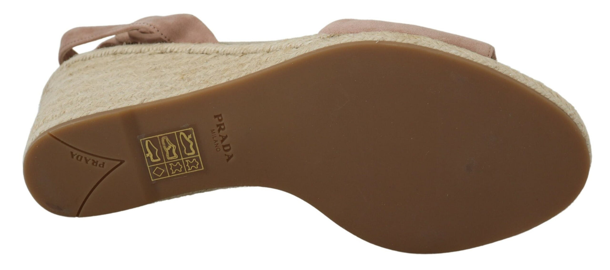 Pair of brown leather shoes with laces and a logo on the side