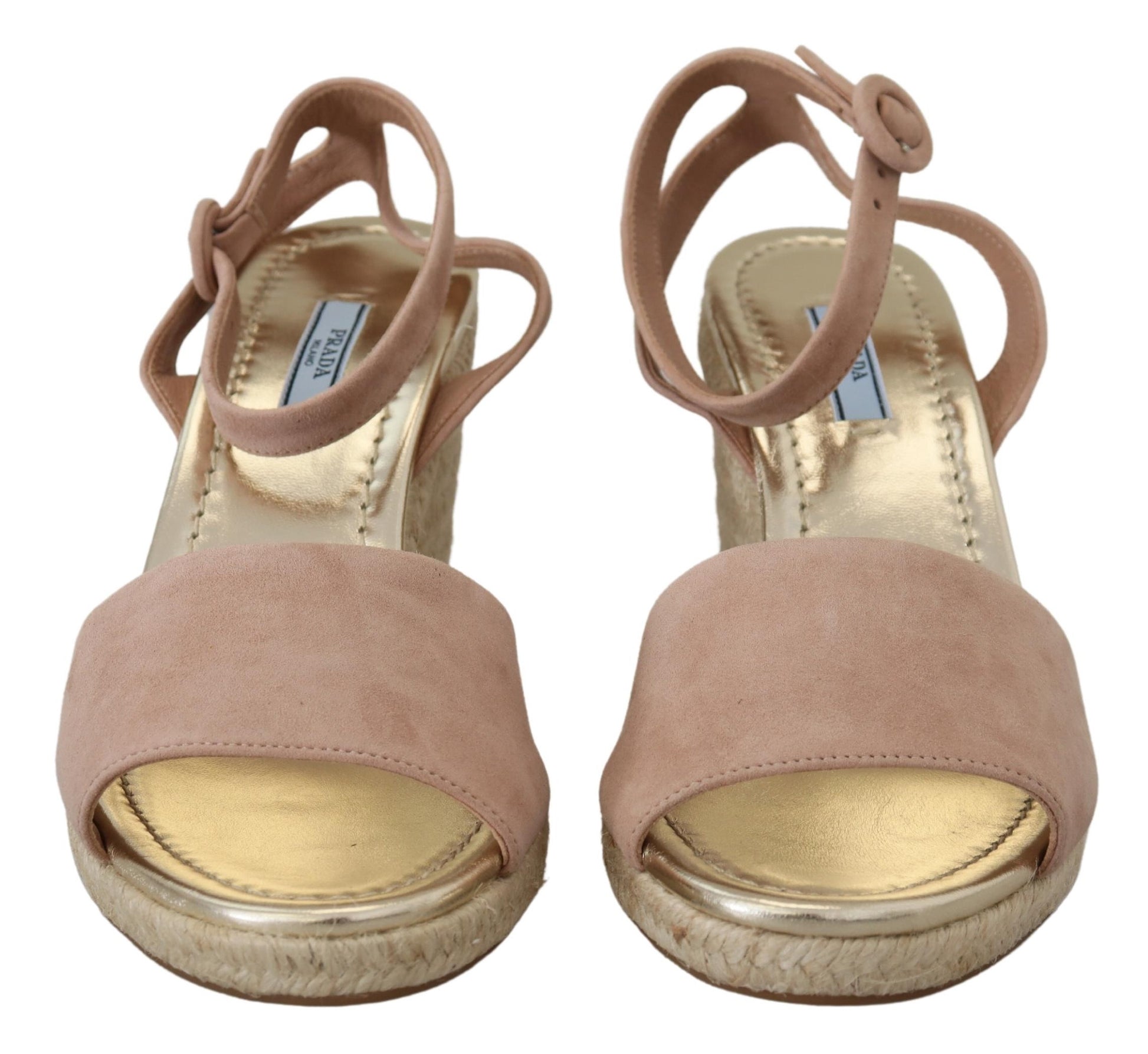 Pair of women's sandals with gold accents and brown straps