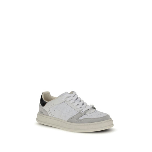 A pair of white sneakers with a low top, featuring calf leather material and laces