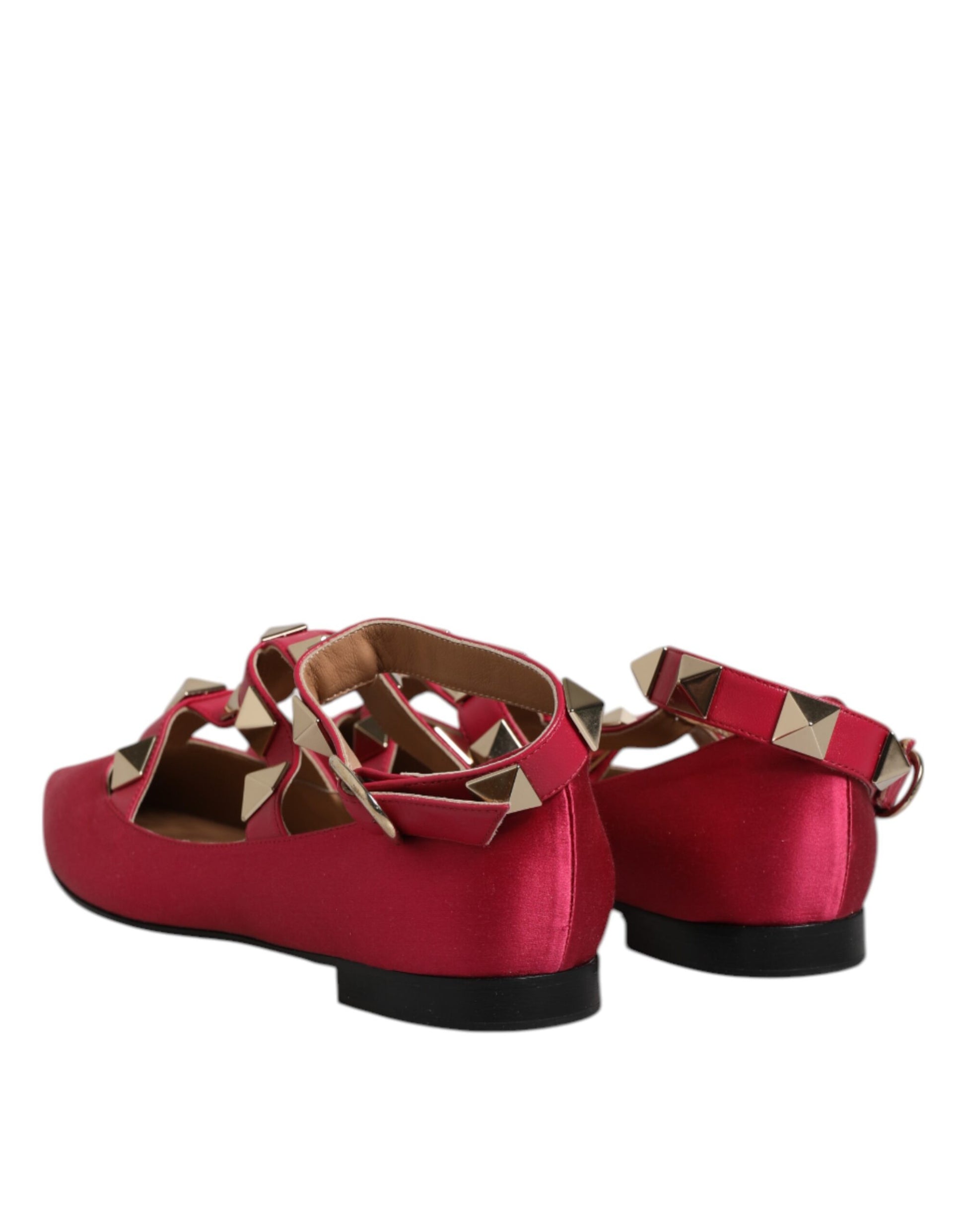 Red suede shoes with gold buckles
