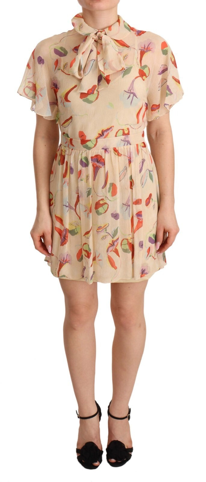 A beige dress with red floral pattern and an ascot collar, short sleeves, and a mini length