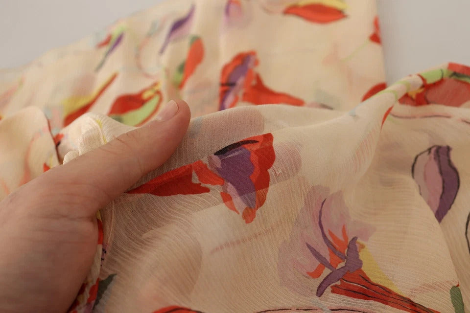 A red floral mini dress with a beige collar and short sleeves