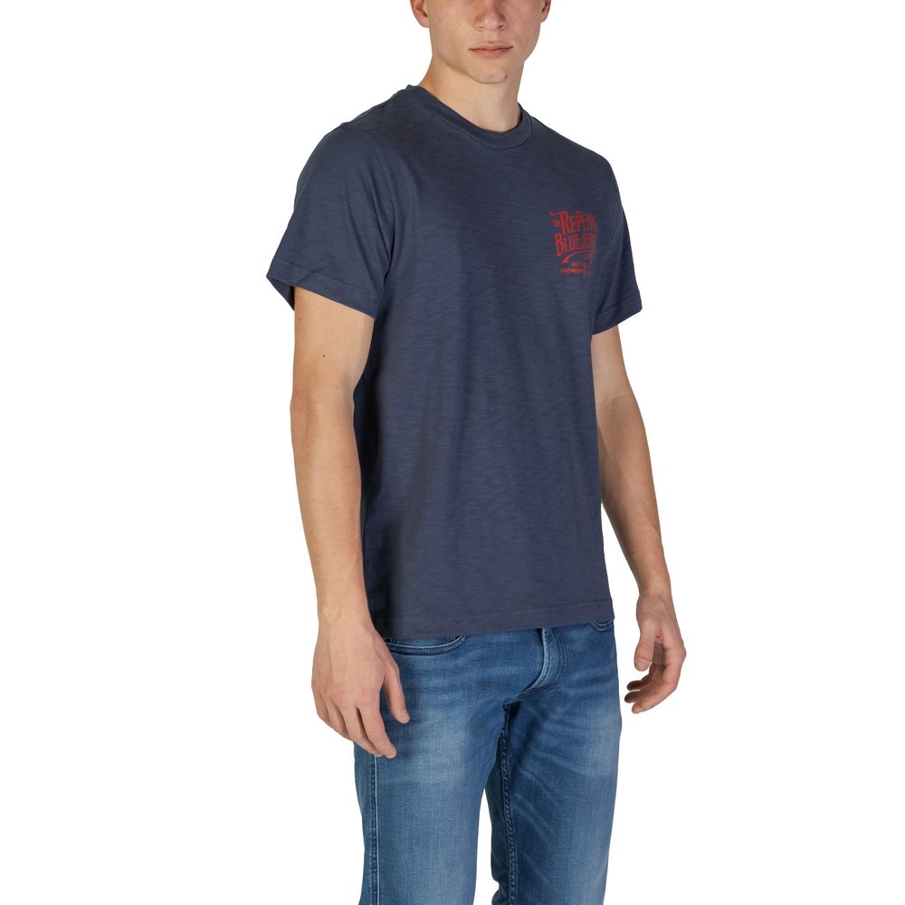 A mannequin wearing a blue cotton t-shirt with red text on it