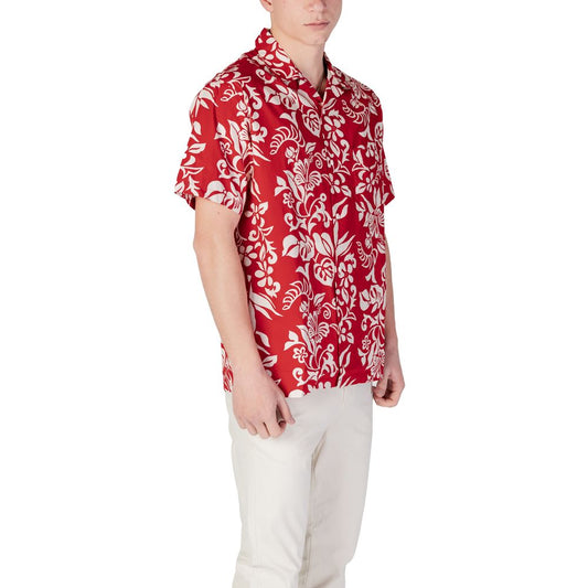 Man wearing red hawaiian shirt with white floral pattern