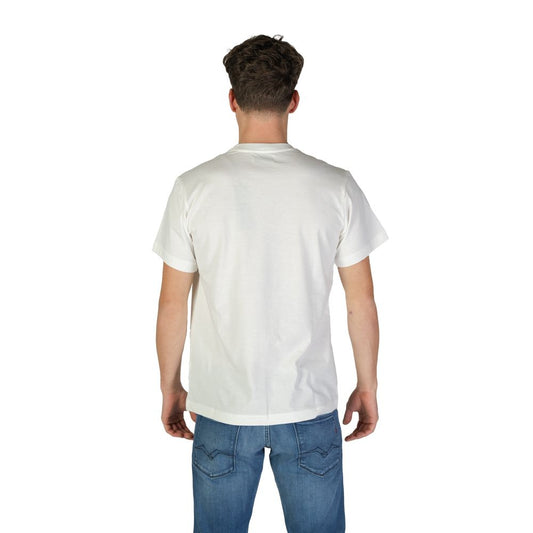 Man wearing white t-shirt and blue jeans
