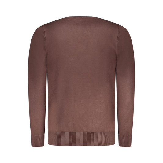 The sweater is maroon in color