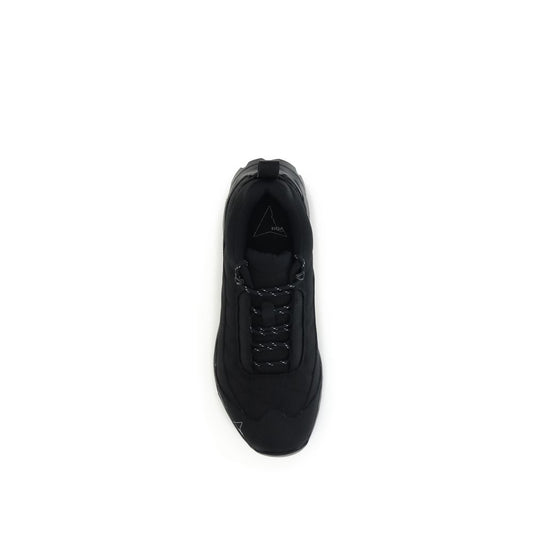 A single black athletic shoe with a white sole, laces, and logo on the side