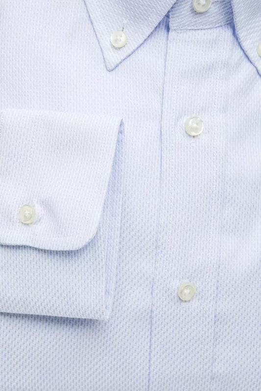 Blue button up shirt with white buttons