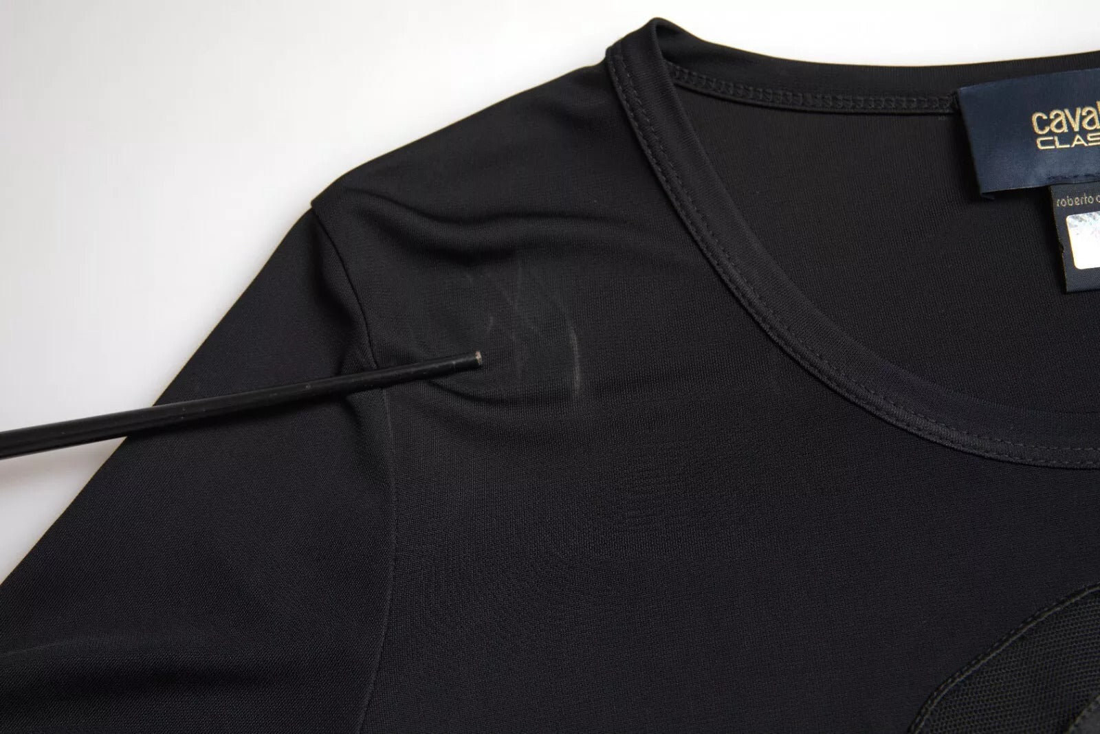 Black t-shirt on hanger
