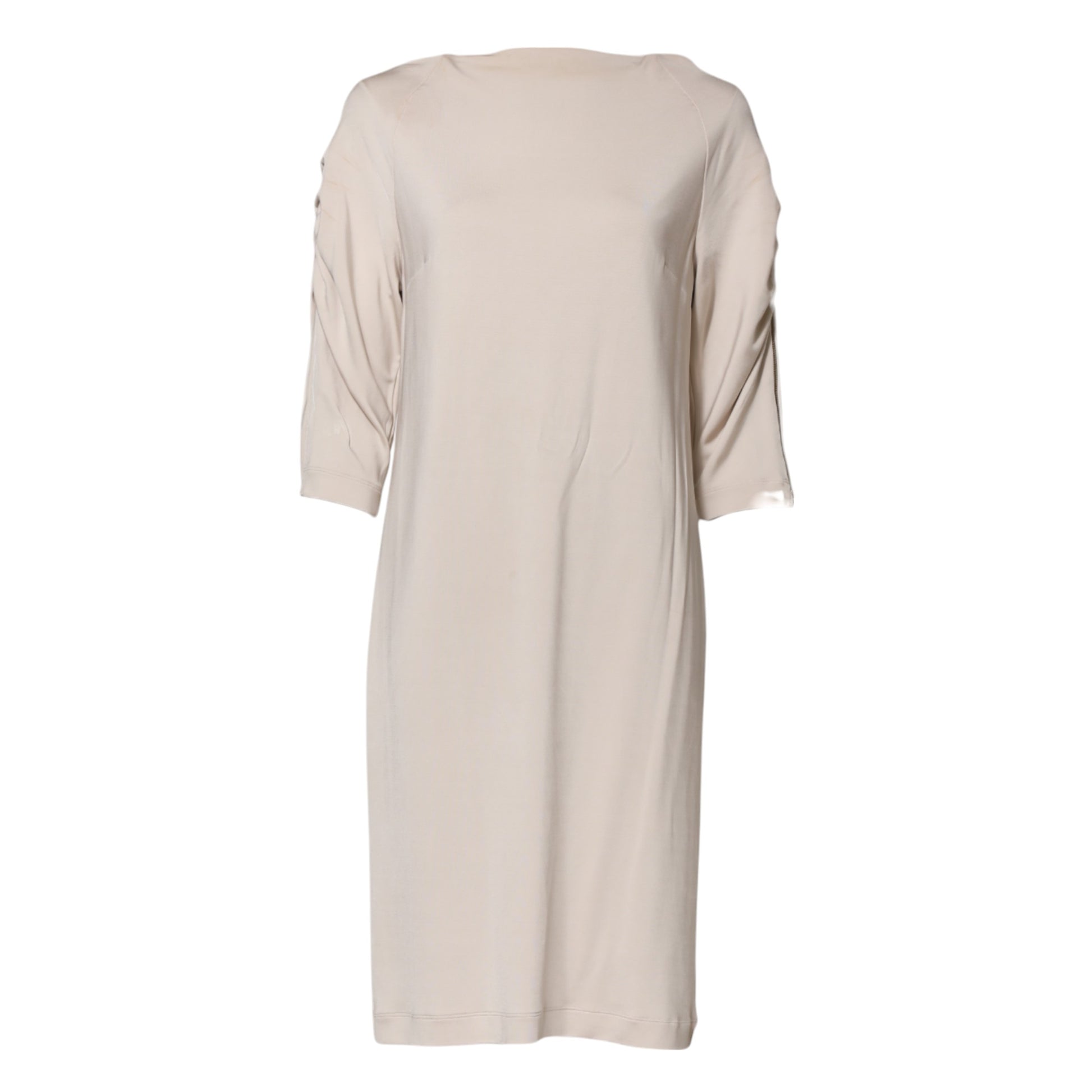 A knee-length dress in a light beige color, made of viscose material