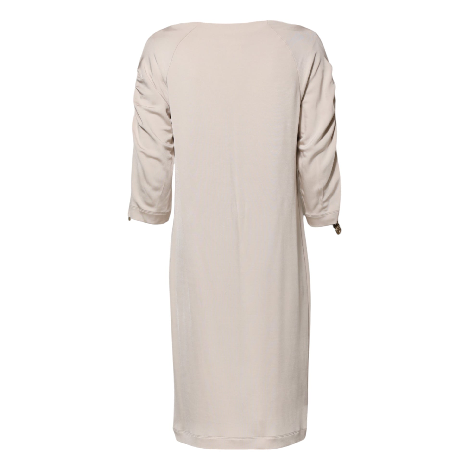 A knee-length dress in a light beige color, made of viscose fabric