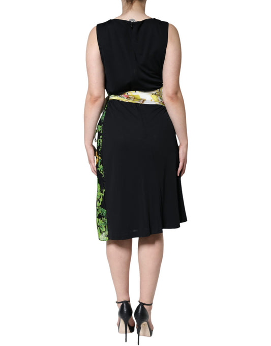 Black knee length dress with floral pattern on bodice and sleeves